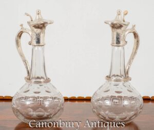 Par de jarras victorianas de clarete, jarra de vidrio cortado y plateado, 1890